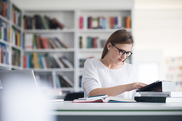 Image showing female student study in school library