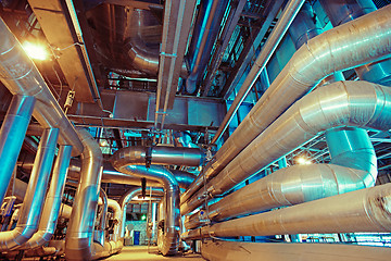 Image showing Equipment, cables and piping as found inside of a modern industr