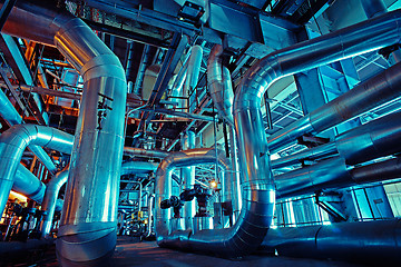 Image showing Equipment, cables and piping as found inside of a modern industr