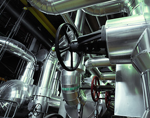 Image showing Equipment, cables and piping as found inside of a modern industr