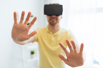 Image showing young man in virtual reality headset or 3d glasses