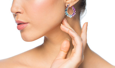 Image showing close up of beautiful woman face with earring