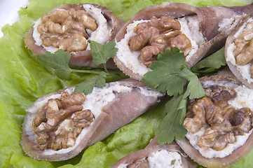 Image showing Tongue stuffed with a nut.