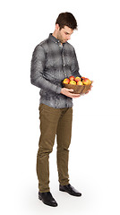 Image showing Healthy man with bowl full of apples