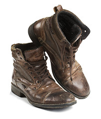 Image showing Dirty old boots isolated. white background