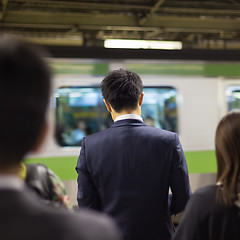 Image showing Passengers traveling by Tokyo metro.