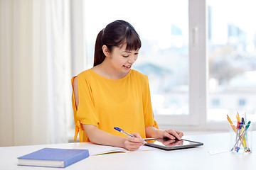 Image showing asian woman student with tablet pc at home