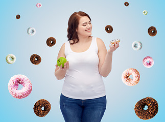 Image showing happy plus size woman choosing apple or cookie