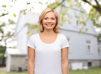 Image showing smiling woman in blank white t-shirt