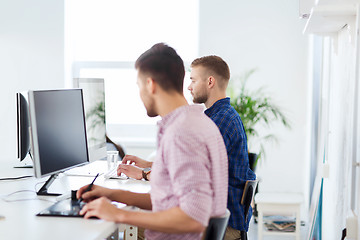 Image showing creative man or student with computer at office