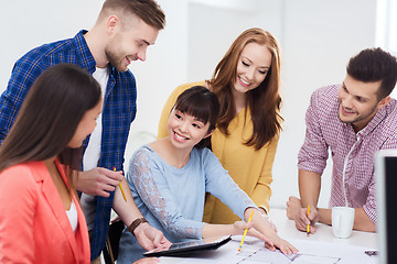 Image showing happy creative team or students working at office