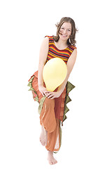 Image showing Colorful dressed female with balloon