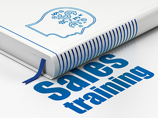 Image showing Marketing concept: book Head With Finance Symbol, Sales Training on white background