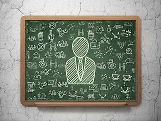 Image showing Business concept: Business Man on School board background