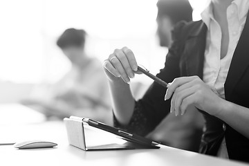 Image showing female  hands holding pen on business meeting