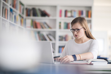 Image showing female student study in school library