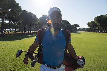 Image showing golf player walking