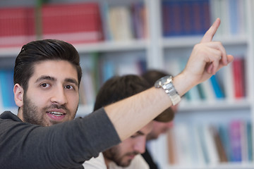 Image showing group of students  raise hands up