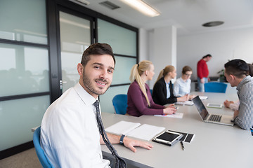 Image showing young business people group on team meeting at modern office