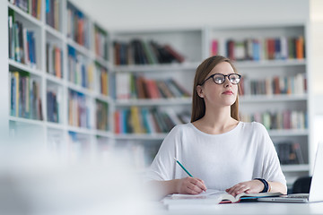 Image showing female student study in school library