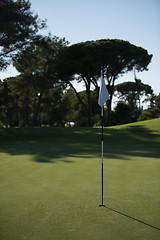 Image showing golfer hitting a sand bunker shot