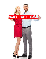 Image showing happy couple with red sale sign