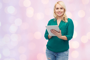 Image showing smiling woman with tablet pc computer