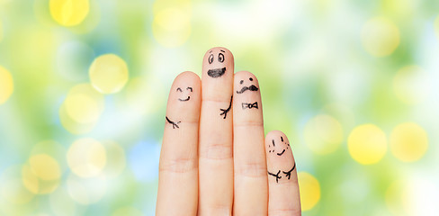 Image showing close up of hands and fingers with smiley faces