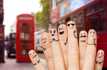 Image showing close up of hands and fingers with smiley faces