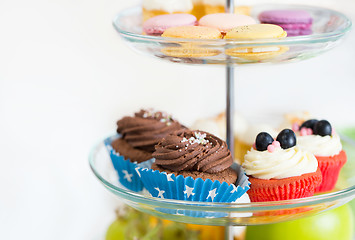 Image showing close up of cake stand with cupcakes and cookies