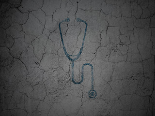 Image showing Medicine concept: Stethoscope on grunge wall background