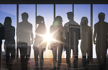 Image showing people silhouettes over city airport background