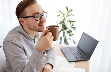 Image showing creative man or businessman drinking coffee