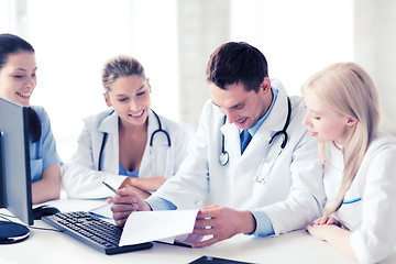 Image showing young team or group of doctors on meeting