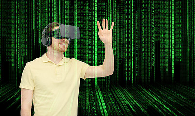 Image showing happy man in virtual reality headset or 3d glasses