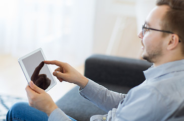Image showing man with tablet pc at home
