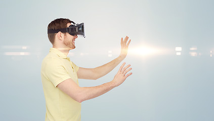 Image showing happy man in virtual reality headset or 3d glasses