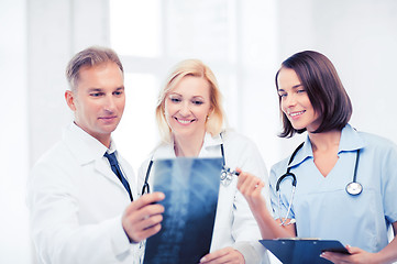 Image showing doctors looking at x-ray