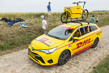 Image showing DHL Vehicle on a Cobblestone Road- Tour de France 2015