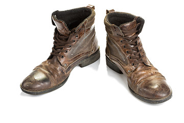 Image showing Dirty old boots isolated. white background