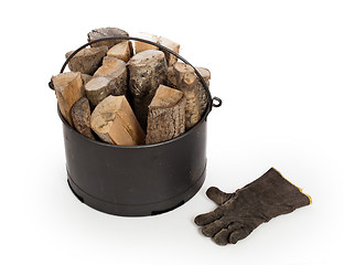 Image showing Metal basket of firewood