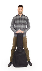 Image showing Musican with acoustic guitar in bag