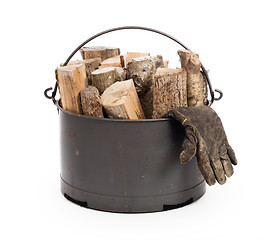 Image showing Metal basket of firewood