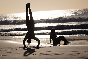 Image showing Happy couple having fun on beach.