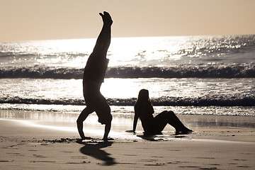 Image showing Happy couple having fun on beach.