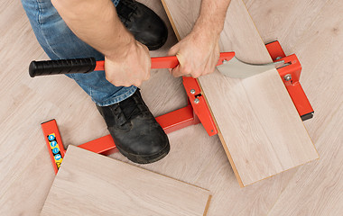 Image showing Red tool for cutting laminate