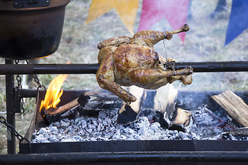 Image showing Roasting Chicken on spit