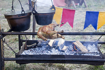 Image showing Roasting Chicken on spit