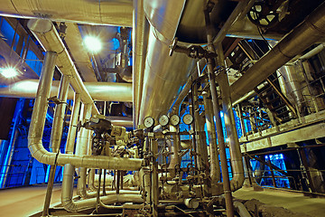 Image showing Equipment, cables and piping as found inside of a modern industr