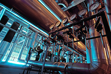 Image showing Equipment, cables and piping as found inside of a modern industrial power plant